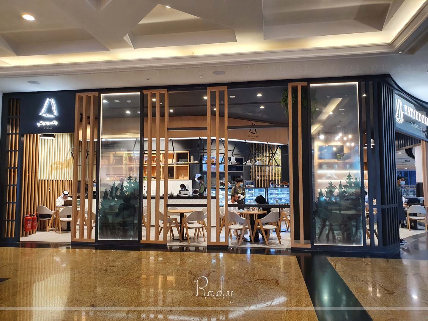 Yatsudoki Bakery interior fit-out featuring premium finishes and refined dining atmosphere.