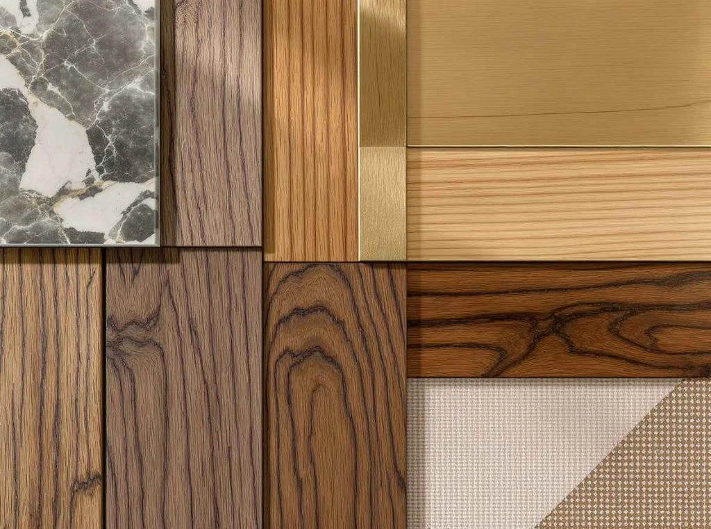 A collection of diverse wood and metal panels arranged together, showcasing different textures and finishes.