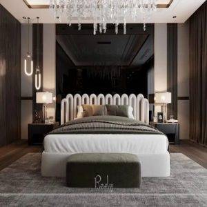 Luxury master bedroom interior design in Dubai featuring bespoke upholstered bed, ambient lighting, dark wood finishes, and elegant décor by Rady Interior